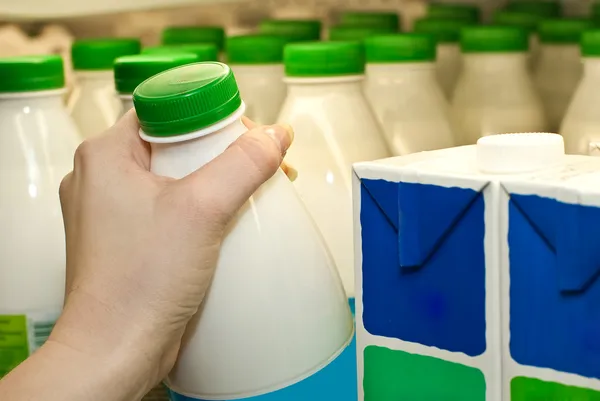 Buying milk — Stock Photo, Image