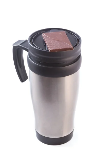 Coffee thermos mug with chocolate — Stock Photo, Image