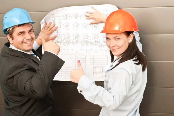 Director with subordinates on construction site — Stock Photo, Image