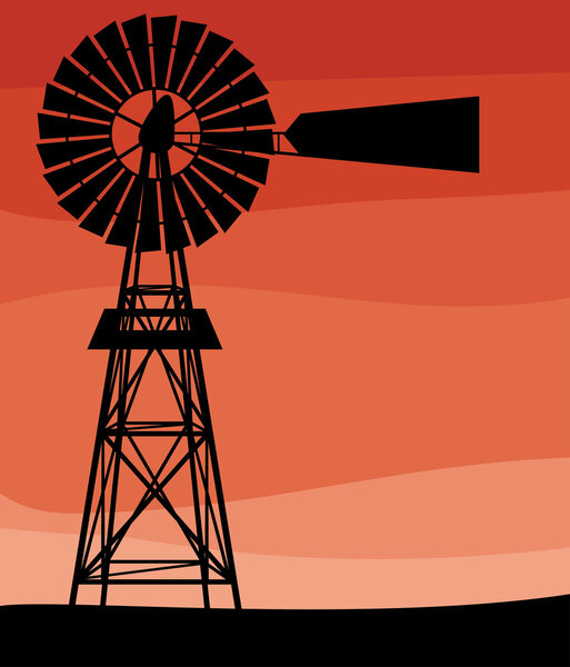 Silhouette of a water pumping windmill