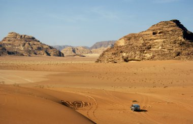 jeep car in rocky desert clipart