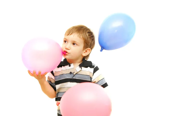 Μικρό παιδί με μπαλόνια πάνω από λευκό — Φωτογραφία Αρχείου