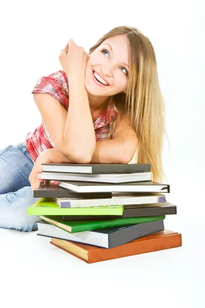 Attractive student girl with pile of books over white — Stock Photo, Image