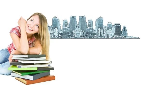 Attractive student girl with pile of books on city background — Stock Photo, Image