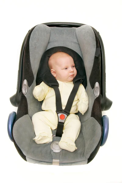Baby in car seat over white — Stock Photo, Image