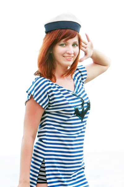 Atraktivní dívka v pruhované vestě zdravit — Stock fotografie