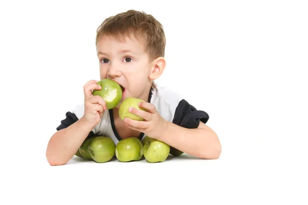 Boy jedl jablka přes bílý — Stock fotografie