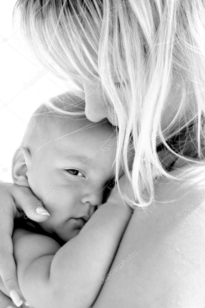 close up portrait of mother and baby over white