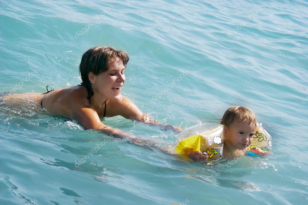mother and baby swimming
