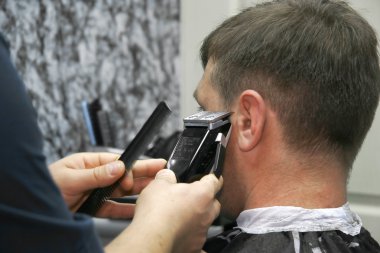 male barber at work clipart