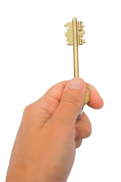 Рука, держащая ключ — стоковое фото