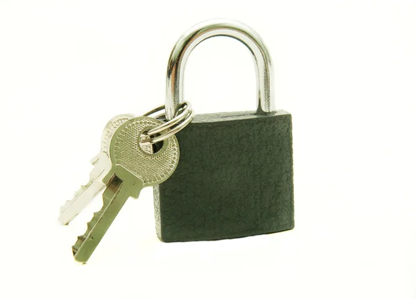 Padlock and two keys over white — Stock Photo, Image