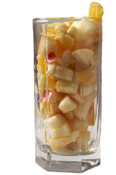 Fruit salad in glass over white — Stock Photo, Image