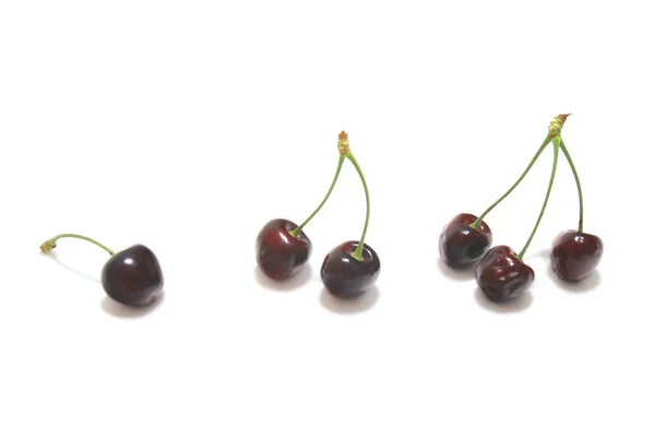 1-2-3 cherries over white — Stock Photo, Image