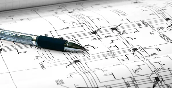Архитектурные планы и ручка — стоковое фото