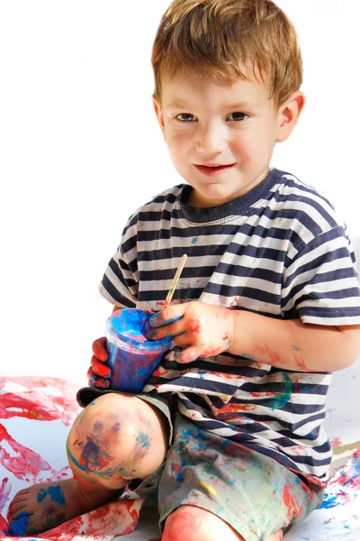 Cute boy painting over white — Stock Photo, Image