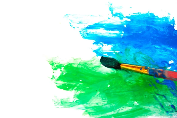 Yeşil ve mavi boya fırçası ile resim çizim — Stok fotoğraf