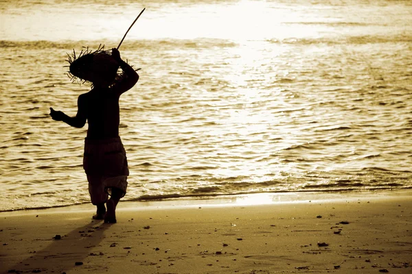 Silhouette of child on sunset sea background — Stock Photo, Image