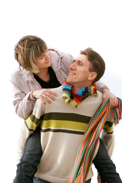 Junges glückliches Paar über Weiß — Stockfoto