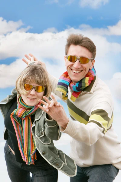 Happy couple over sky background — Stock Photo, Image