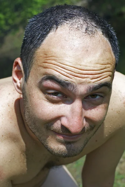 Portret van jonge man na het zwemmen — Stockfoto