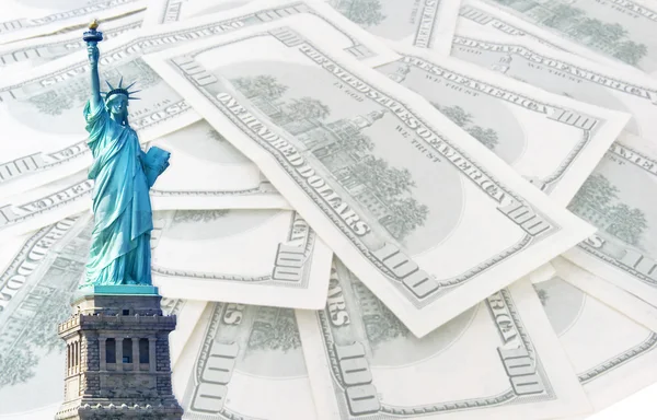 Statue of liberty on 100 us dollars banknotes background — Stock Photo, Image