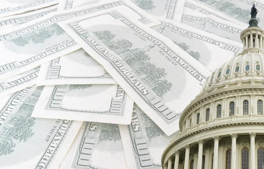 us capitol on 100 us dollars banknotes background