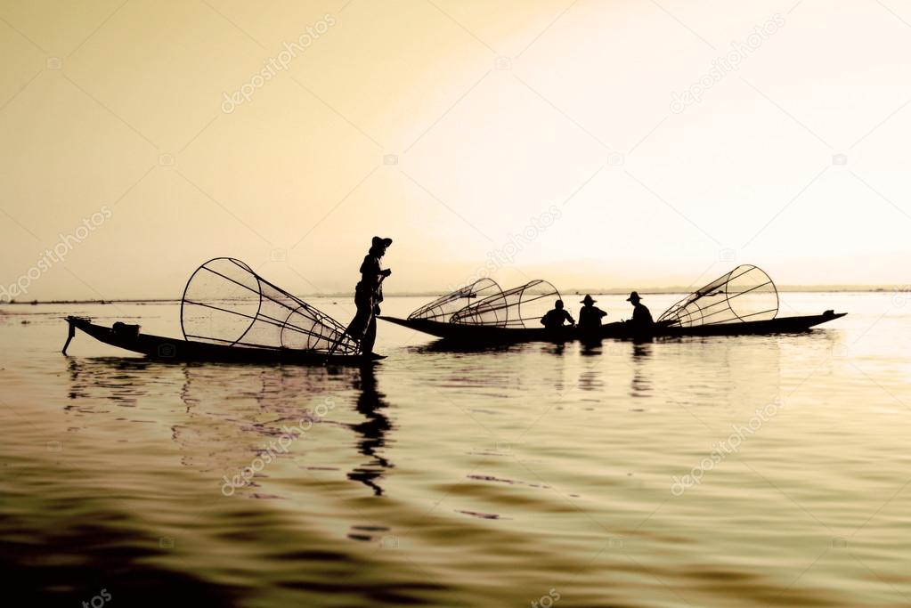 fishermen on water