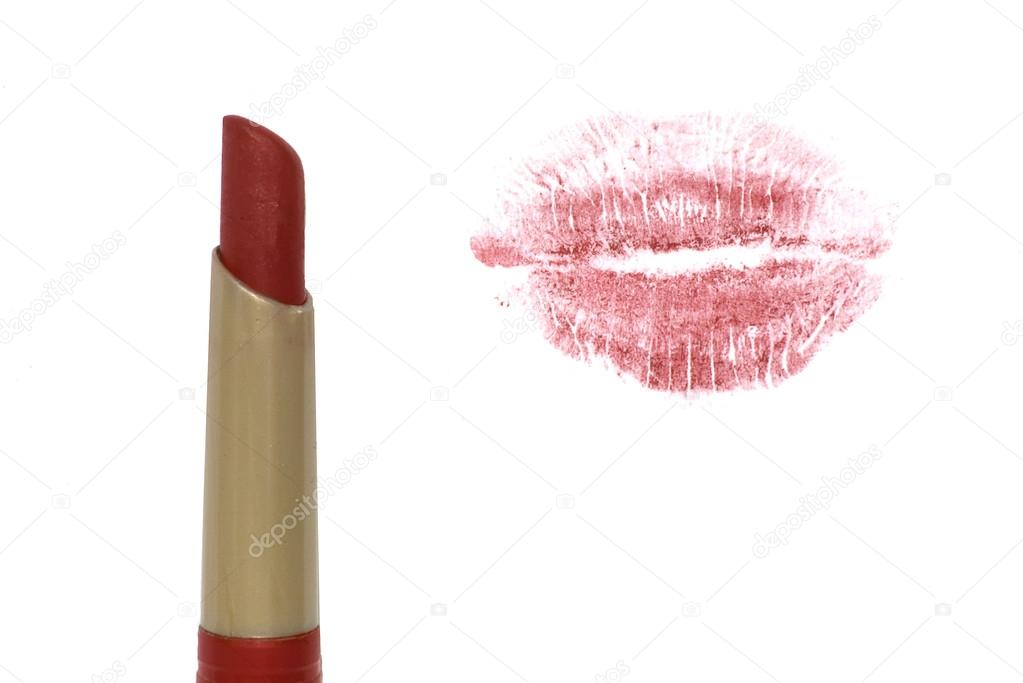 Lipstick and lip imprint over white