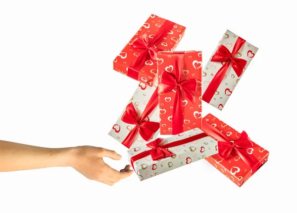 Hand Holding Many Gift Boxes Wrapped Decorated Red Bow Isoalted — Stock Photo, Image