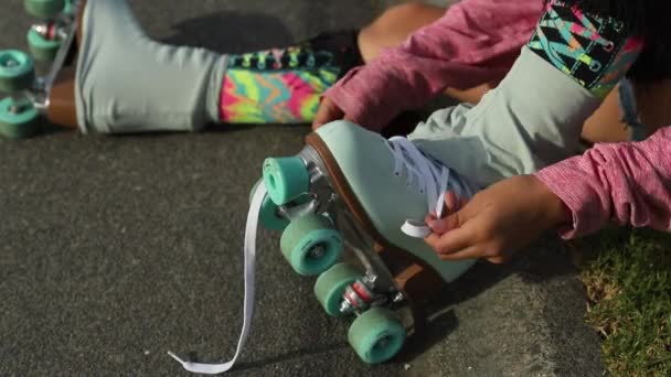 Portrait of young child or teen girl roller skating outdoors, fitness, wellbeing, active healthy lifestyle, video clip — Stock Video