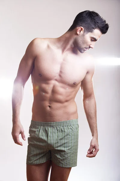 Closeup of a muscular handsome man in underwear — Stock Photo, Image