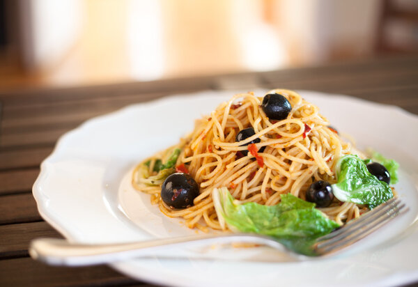 Spaghetti with black olives