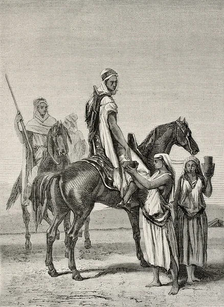 Cavalieri arabi e donne — Foto Stock