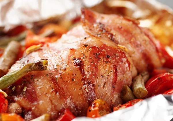 Chicken breast wrapped in bacon and fried — Stock Image Chicken breast wrapped in bacon and fried Royalty Free Stock Images