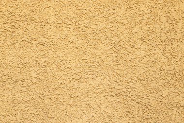 Dekoratif alçı arka plan. Dekoratif desenli Sarı Alçı Arkaplan Koruması