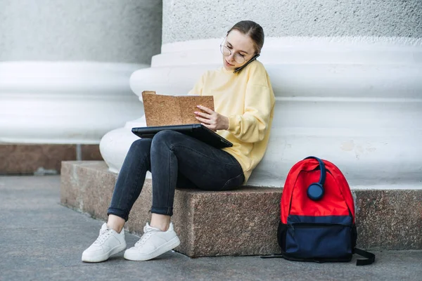 Time Management For Students, Outdoor portrait of girl with laptop, papers and books near college, university
