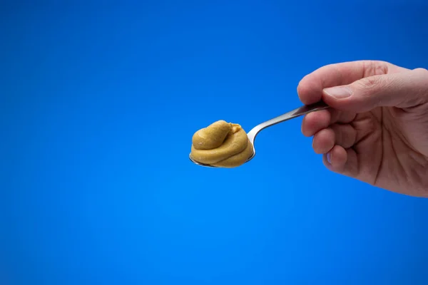 Mustard Paste Small Silver Spoon Held Hand Man Close Studio — Stock Photo, Image