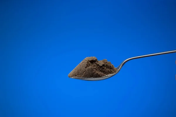 Finely Ground Black Pepper Powder Small Silver Spoon Close Studio — Stock Photo, Image