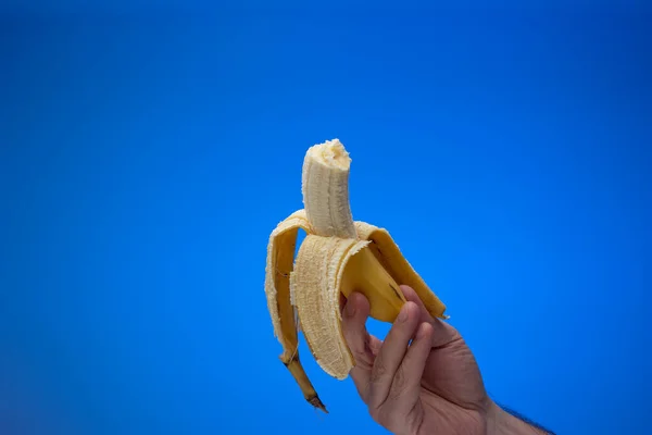 Ripe Yellow Half Peeled Banana Held Hand Caucasian Male Hand — Stock Photo, Image