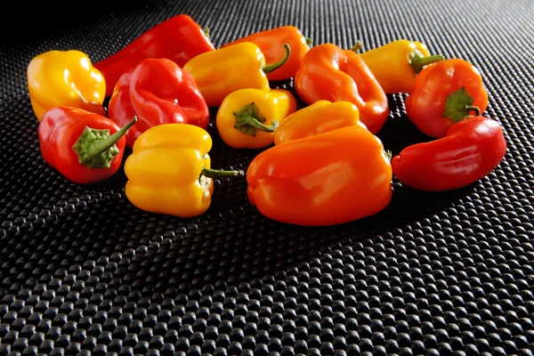 Red, Orange and Yellow Mini Bell Peppers — стокове фото