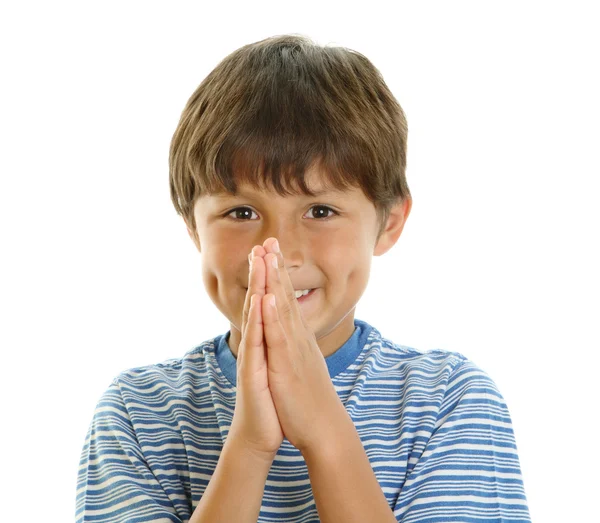 Young boy smiling with hands together — Stock Photo, Image