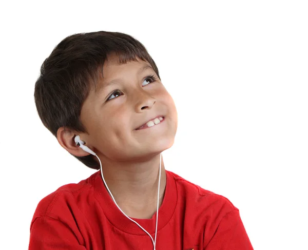 หนุ่มยิ้ม เด็กชายมีความสุขกับหูฟัง — ภาพถ่ายสต็อก