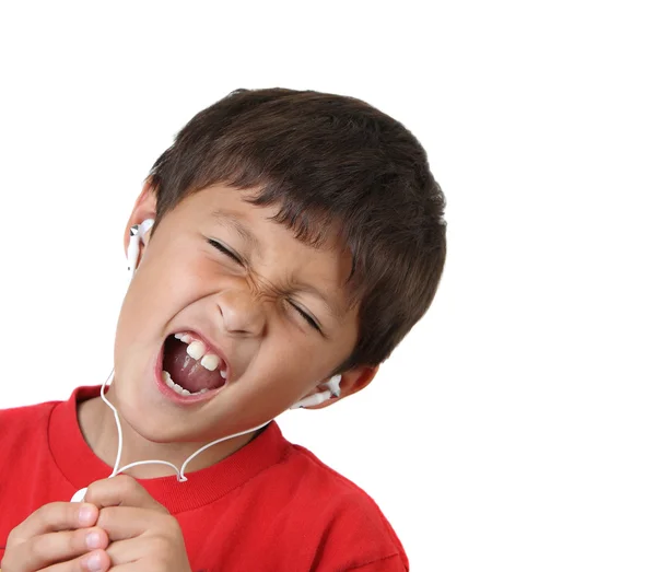 Niño cantando con auriculares —  Fotos de Stock