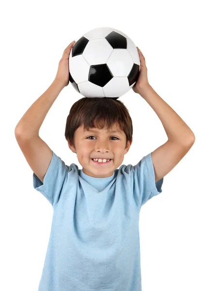 Мальчик с мячом на голове — стоковое фото