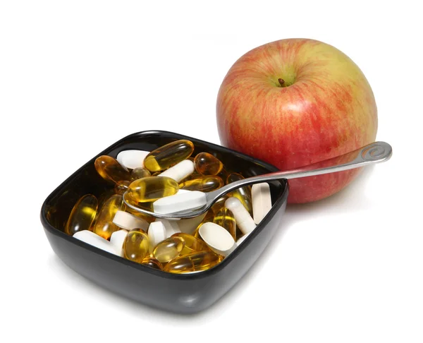 Apple con pillole vitaminiche — Foto Stock