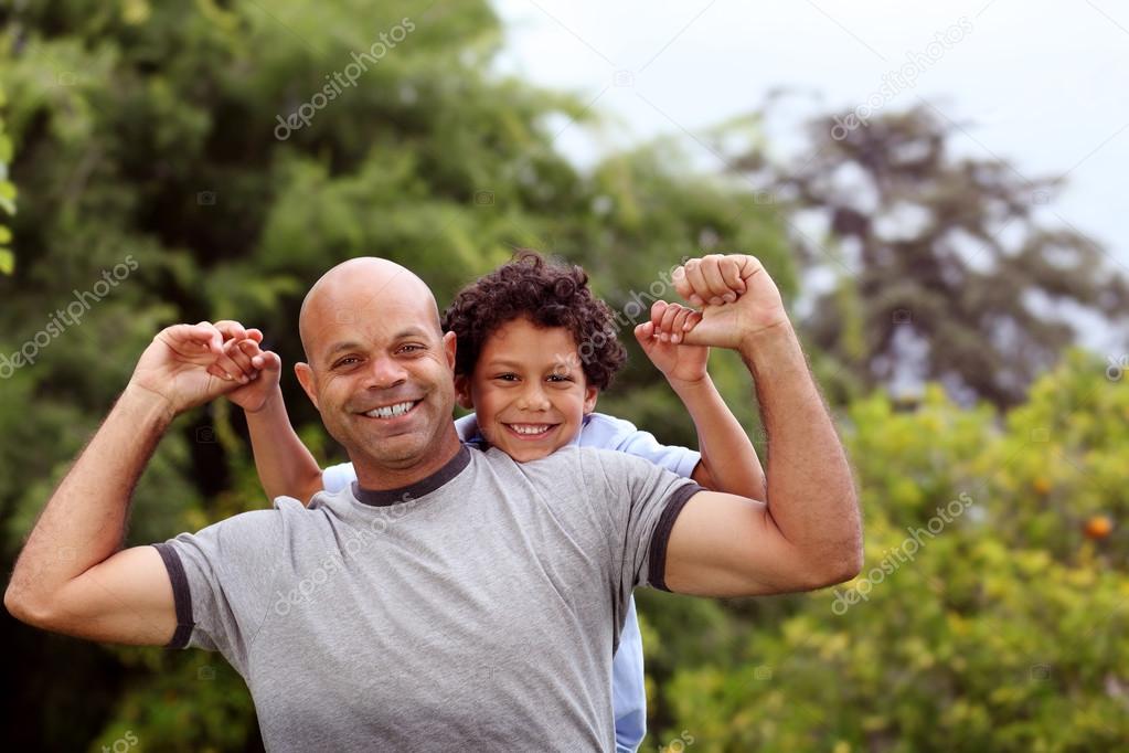 Mixed race father and son