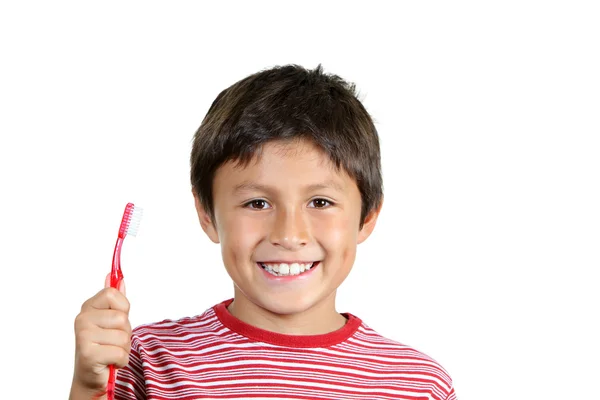 Genç çocuk, dişlerini fırçalayıp fırçalamadığını — Stok fotoğraf