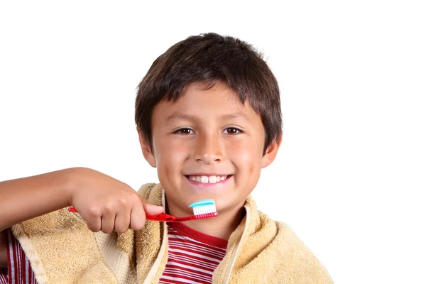 Ung pojke borstar sina tänder — Stockfoto