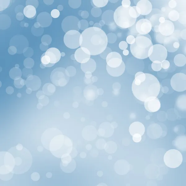Bokeh julgranskulor på blå bakgrund — Stockfoto